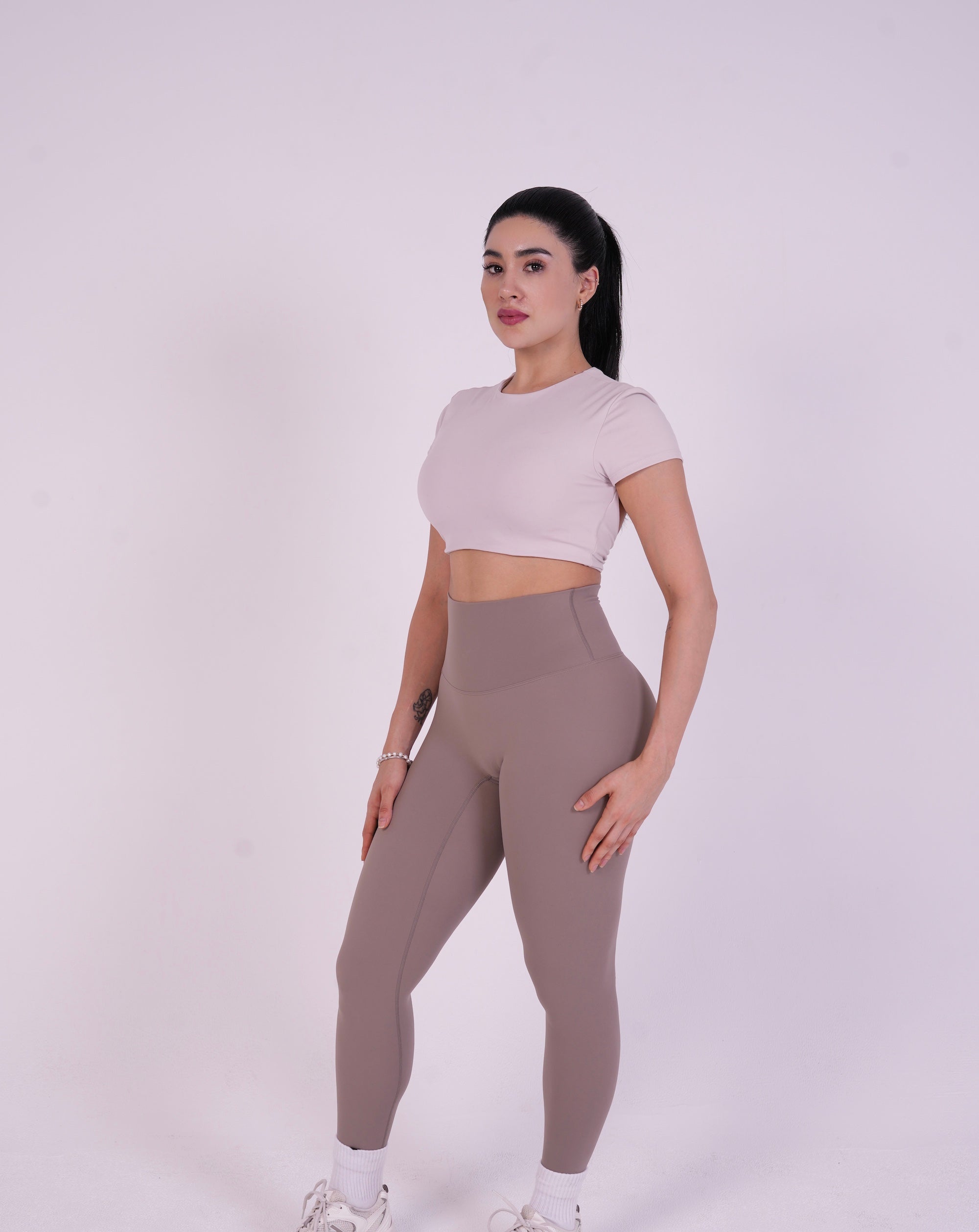 NAVA Smokey Quartz cropped active top front view on model