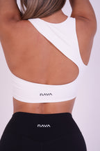 NAVA Milky Quartz one-shoulder sports bra back view – white asymmetrical activewear top with cutout design