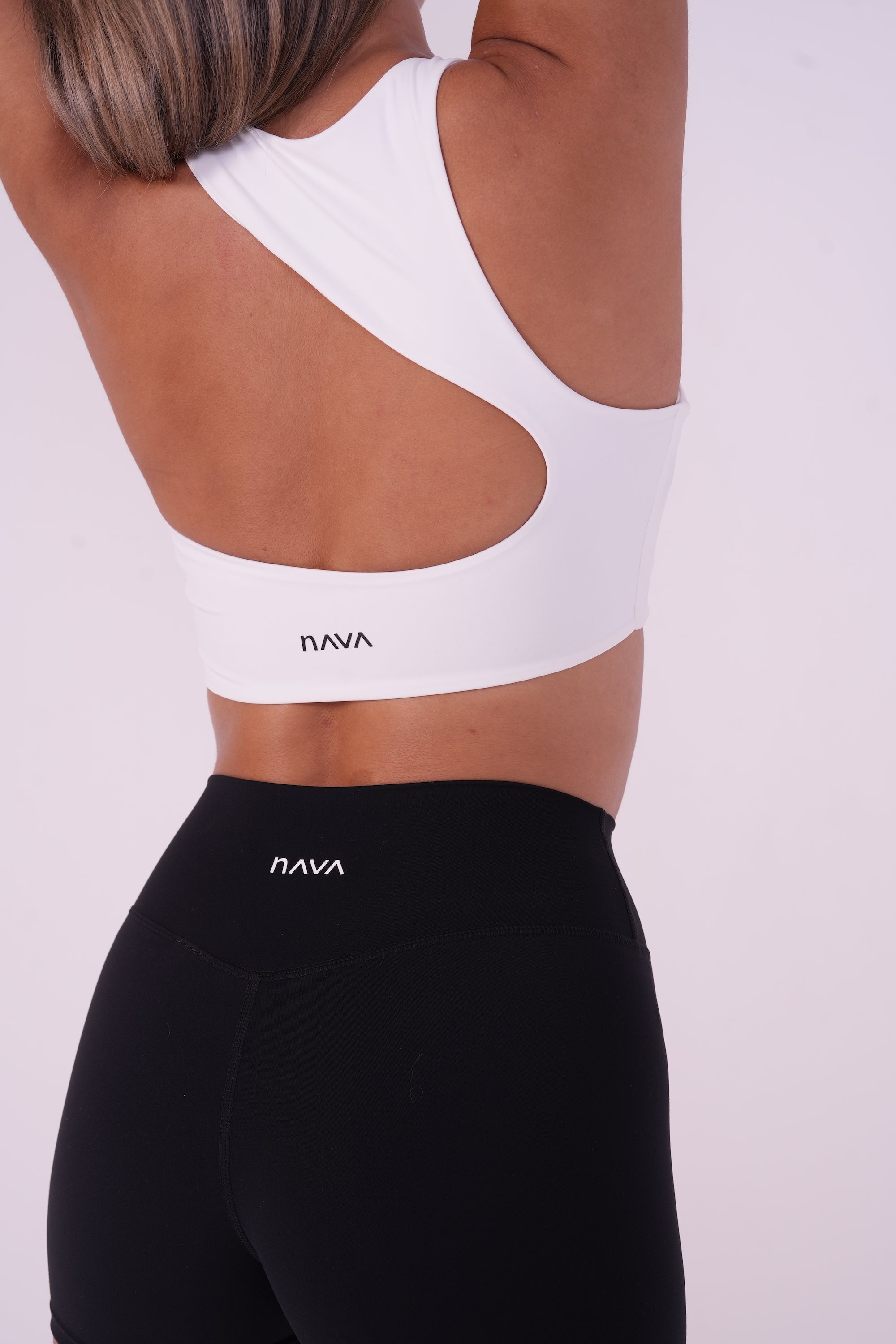 Back view of the NAVA Onyx Black shorts, highlighting the smooth high-rise fit and clean activewear silhouette UAE.